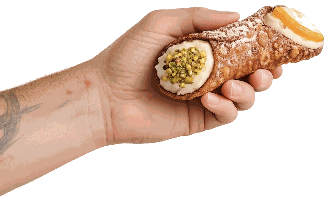 Mano con cannolo siciliano Barrano